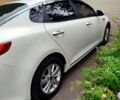 Белый Киа K5, объемом двигателя 2 л и пробегом 143 тыс. км за 10500 $, фото 1 на Automoto.ua