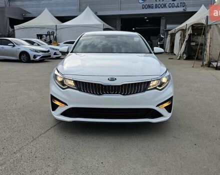 Белый Киа K5, объемом двигателя 2 л и пробегом 405 тыс. км за 12490 $, фото 1 на Automoto.ua