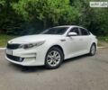 Білий Кіа K5, об'ємом двигуна 2 л та пробігом 245 тис. км за 11200 $, фото 1 на Automoto.ua