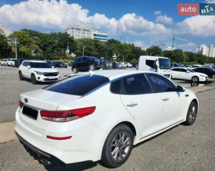 Белый Киа K5, объемом двигателя 2 л и пробегом 143 тыс. км за 16000 $, фото 2 на Automoto.ua