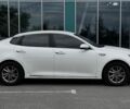 Белый Киа K5, объемом двигателя 2 л и пробегом 155 тыс. км за 14000 $, фото 12 на Automoto.ua