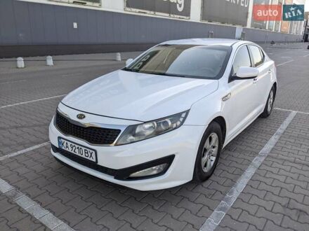 Белый Киа K5, объемом двигателя 2 л и пробегом 420 тыс. км за 7200 $, фото 1 на Automoto.ua
