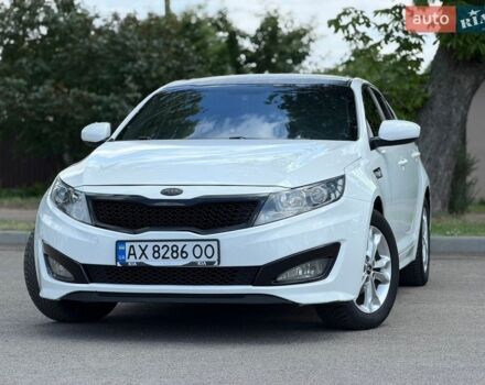 Белый Киа K5, объемом двигателя 2 л и пробегом 325 тыс. км за 8300 $, фото 1 на Automoto.ua