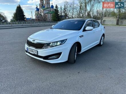 Белый Киа K5, объемом двигателя 2 л и пробегом 322 тыс. км за 8500 $, фото 1 на Automoto.ua