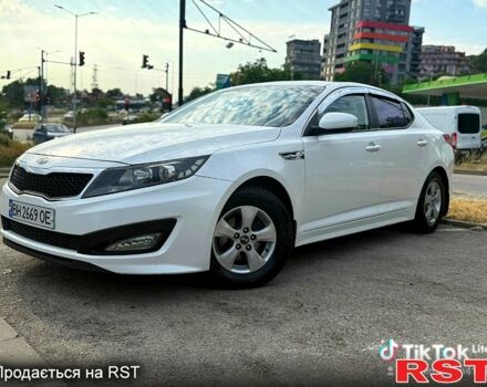Белый Киа K5, объемом двигателя 2 л и пробегом 172 тыс. км за 7200 $, фото 1 на Automoto.ua