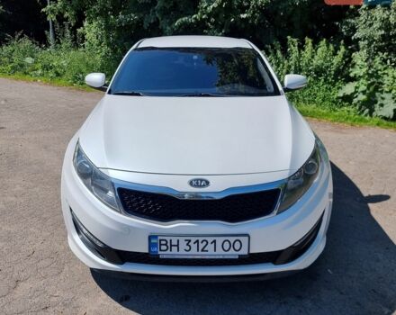 Белый Киа K5, объемом двигателя 2 л и пробегом 290 тыс. км за 7399 $, фото 1 на Automoto.ua