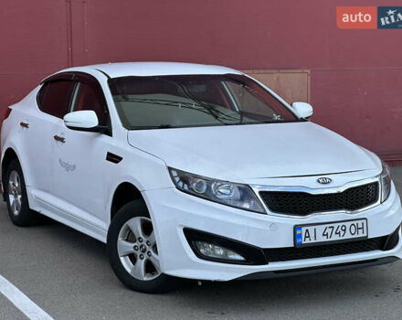 Білий Кіа K5, об'ємом двигуна 2 л та пробігом 422 тис. км за 6999 $, фото 1 на Automoto.ua