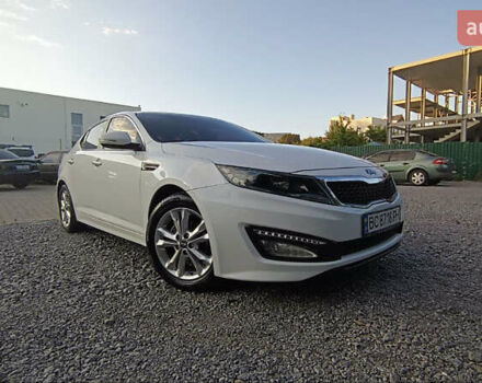 Білий Кіа K5, об'ємом двигуна 2 л та пробігом 209 тис. км за 10200 $, фото 1 на Automoto.ua