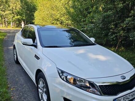 Белый Киа K5, объемом двигателя 2 л и пробегом 240 тыс. км за 9990 $, фото 1 на Automoto.ua