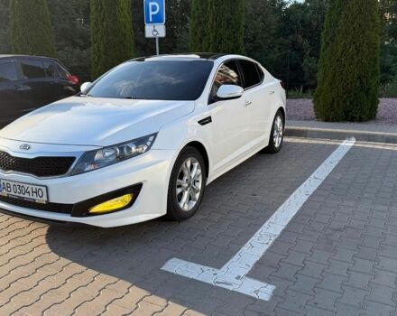 Белый Киа K5, объемом двигателя 2 л и пробегом 315 тыс. км за 10000 $, фото 1 на Automoto.ua