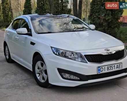 Белый Киа K5, объемом двигателя 2 л и пробегом 138 тыс. км за 7199 $, фото 1 на Automoto.ua