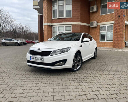 Белый Киа K5, объемом двигателя 2 л и пробегом 260 тыс. км за 9999 $, фото 1 на Automoto.ua