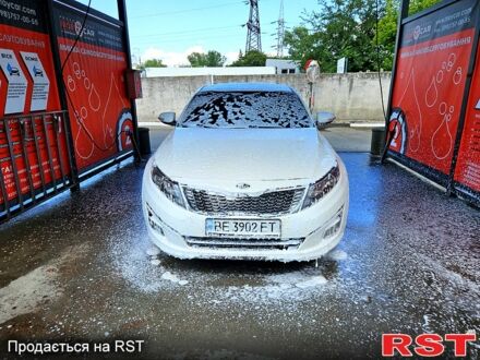 Белый Киа K5, объемом двигателя 2 л и пробегом 378 тыс. км за 9000 $, фото 1 на Automoto.ua