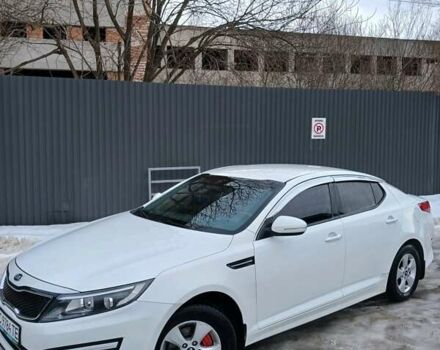 Белый Киа K5, объемом двигателя 2 л и пробегом 265 тыс. км за 9500 $, фото 1 на Automoto.ua