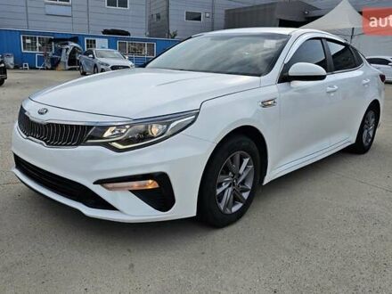 Белый Киа K5, объемом двигателя 2 л и пробегом 405 тыс. км за 12490 $, фото 1 на Automoto.ua