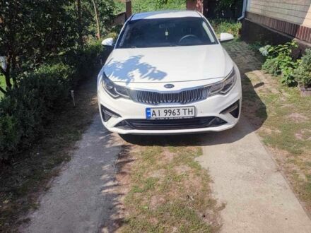 Білий Кіа K5, об'ємом двигуна 2 л та пробігом 170 тис. км за 13005 $, фото 1 на Automoto.ua