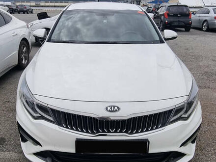 Белый Киа K5, объемом двигателя 2 л и пробегом 143 тыс. км за 15000 $, фото 1 на Automoto.ua