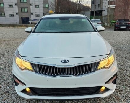 Белый Киа K5, объемом двигателя 2 л и пробегом 313 тыс. км за 12990 $, фото 1 на Automoto.ua