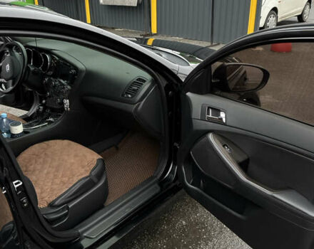 Чорний Кіа K5, об'ємом двигуна 2 л та пробігом 146 тис. км за 8999 $, фото 14 на Automoto.ua