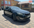 Черный Киа K5, объемом двигателя 2 л и пробегом 234 тыс. км за 7999 $, фото 1 на Automoto.ua