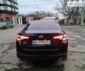 Черный Киа K5, объемом двигателя 2 л и пробегом 405 тыс. км за 9900 $, фото 5 на Automoto.ua