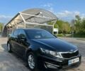 Чорний Кіа K5, об'ємом двигуна 2 л та пробігом 304 тис. км за 9500 $, фото 1 на Automoto.ua
