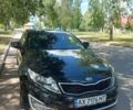 Черный Киа K5, объемом двигателя 2 л и пробегом 185 тыс. км за 10100 $, фото 1 на Automoto.ua