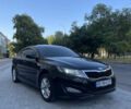 Черный Киа K5, объемом двигателя 2 л и пробегом 272 тыс. км за 8700 $, фото 1 на Automoto.ua
