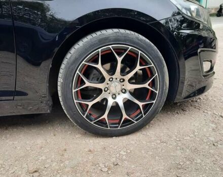 Черный Киа K5, объемом двигателя 2 л и пробегом 237 тыс. км за 8500 $, фото 2 на Automoto.ua