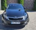 Черный Киа K5, объемом двигателя 2 л и пробегом 260 тыс. км за 9600 $, фото 1 на Automoto.ua