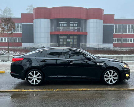 Черный Киа K5, объемом двигателя 2 л и пробегом 284 тыс. км за 11000 $, фото 4 на Automoto.ua