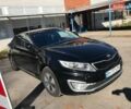 Черный Киа K5, объемом двигателя 2 л и пробегом 142 тыс. км за 5956 $, фото 1 на Automoto.ua