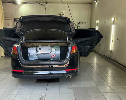 Черный Киа K5, объемом двигателя 2 л и пробегом 445 тыс. км за 6500 $, фото 13 на Automoto.ua