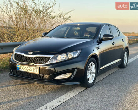 Черный Киа K5, объемом двигателя 2 л и пробегом 256 тыс. км за 9000 $, фото 1 на Automoto.ua