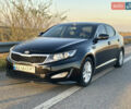 Черный Киа K5, объемом двигателя 2 л и пробегом 256 тыс. км за 9000 $, фото 1 на Automoto.ua