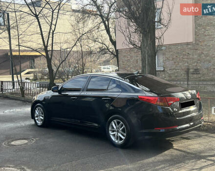 Черный Киа K5, объемом двигателя 2 л и пробегом 445 тыс. км за 6500 $, фото 5 на Automoto.ua