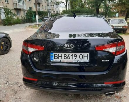 Черный Киа K5, объемом двигателя 2 л и пробегом 237 тыс. км за 8500 $, фото 3 на Automoto.ua
