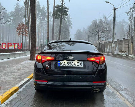 Черный Киа K5, объемом двигателя 2 л и пробегом 284 тыс. км за 9450 $, фото 3 на Automoto.ua