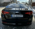 Черный Киа K5, объемом двигателя 2 л и пробегом 256 тыс. км за 9000 $, фото 16 на Automoto.ua