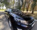 Черный Киа K5, объемом двигателя 2 л и пробегом 209 тыс. км за 8200 $, фото 4 на Automoto.ua