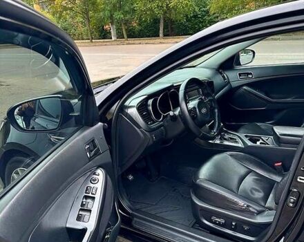 Черный Киа K5, объемом двигателя 2 л и пробегом 324 тыс. км за 9250 $, фото 2 на Automoto.ua