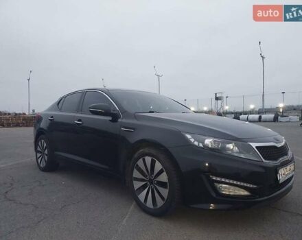Черный Киа K5, объемом двигателя 2 л и пробегом 281 тыс. км за 11200 $, фото 6 на Automoto.ua