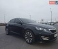 Черный Киа K5, объемом двигателя 2 л и пробегом 281 тыс. км за 11200 $, фото 6 на Automoto.ua
