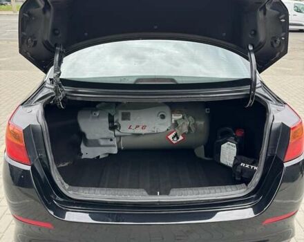 Черный Киа K5, объемом двигателя 2 л и пробегом 323 тыс. км за 8500 $, фото 10 на Automoto.ua