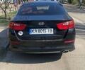 Черный Киа K5, объемом двигателя 2 л и пробегом 450 тыс. км за 6800 $, фото 3 на Automoto.ua