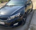 Черный Киа K5, объемом двигателя 2 л и пробегом 471 тыс. км за 7555 $, фото 1 на Automoto.ua
