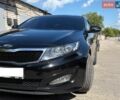 Черный Киа K5, объемом двигателя 2 л и пробегом 234 тыс. км за 8100 $, фото 1 на Automoto.ua