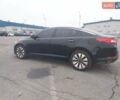Черный Киа K5, объемом двигателя 2 л и пробегом 281 тыс. км за 11200 $, фото 1 на Automoto.ua
