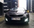 Черный Киа K5, объемом двигателя 2 л и пробегом 255 тыс. км за 9750 $, фото 1 на Automoto.ua