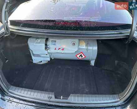 Черный Киа K5, объемом двигателя 2 л и пробегом 136 тыс. км за 8600 $, фото 11 на Automoto.ua